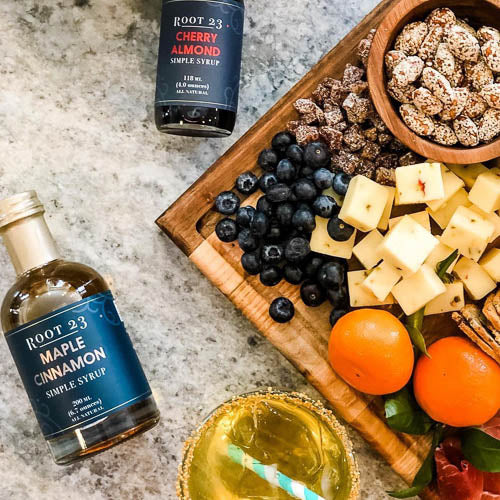 cheese board with root 23 syrups